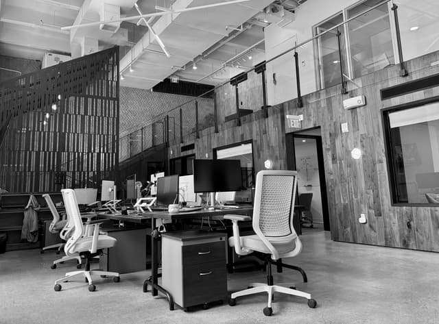 Office with desks and a balcony