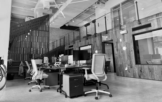 Office with desks and a balcony